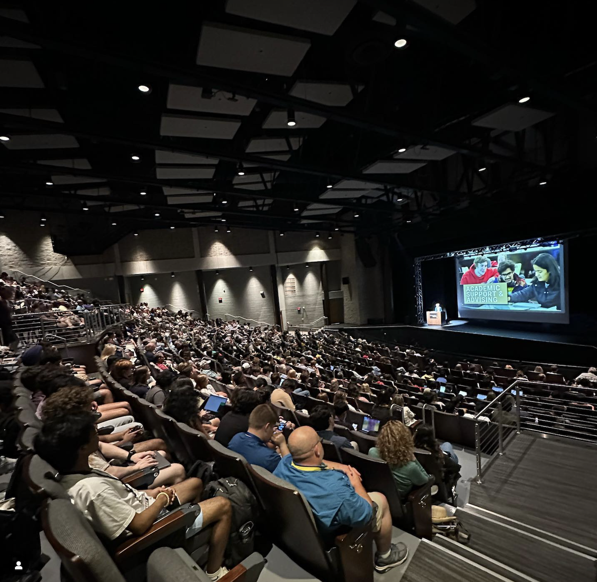 students and family in an auditorium